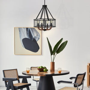 Gateway 4Light caged Drum chandelier hung above a round wood dining table.