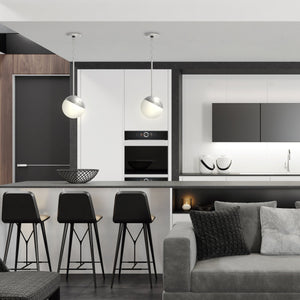 2 Brushed nickel Milan pendant lights above kitchen island.